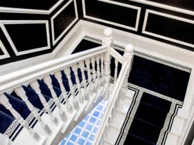 Staircase with white and blue carpet