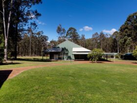Photos shows Hunter Valley Retreat Conference Centre outside of building surrounded by bush area