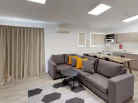 Jindabyne's living room in the two bedroom apartment