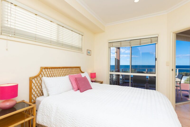 Bedroom with Queen bed and panoramic ocean views