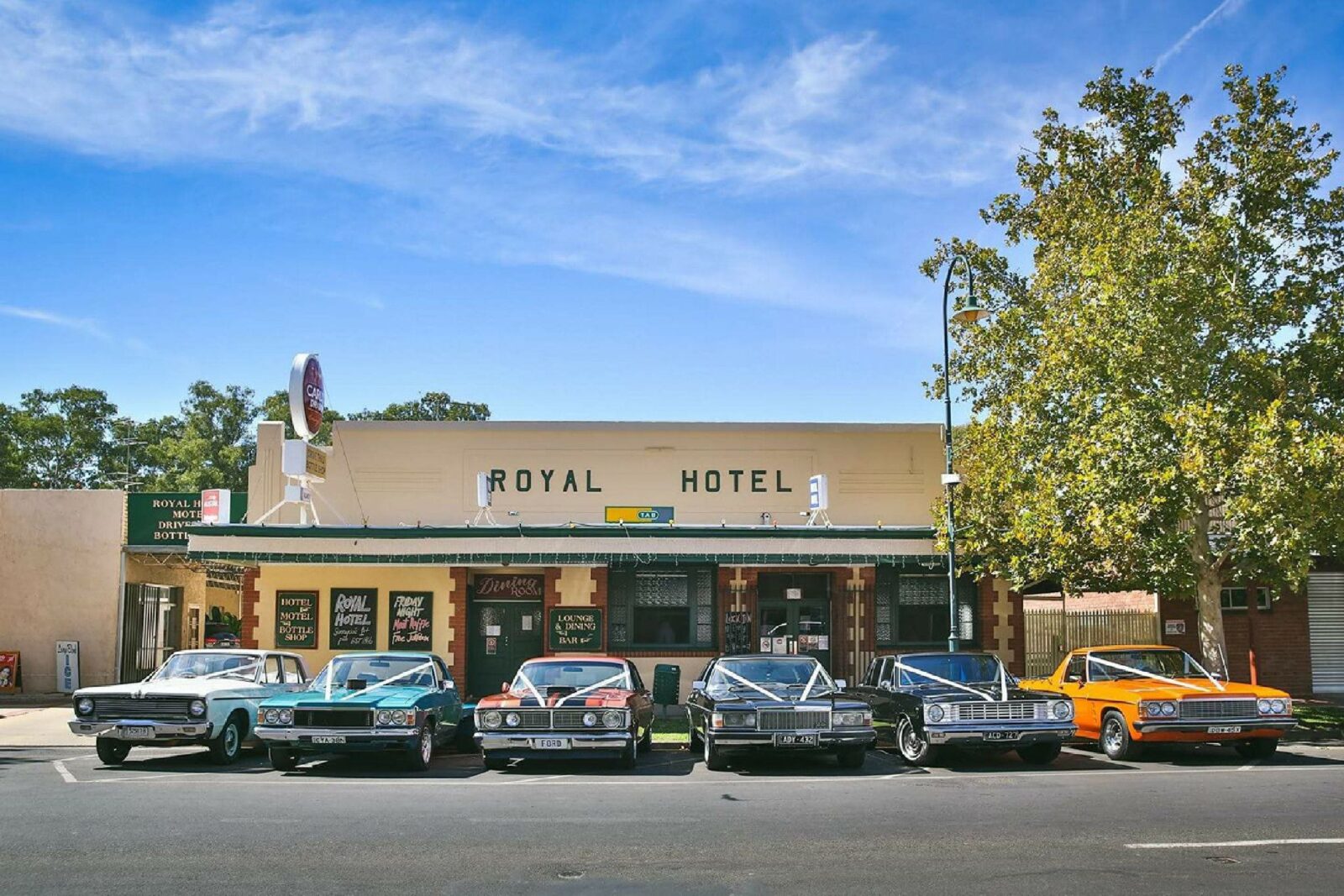 Royal Hotel and wedding cars out front