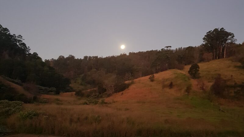 Moon rising over the hills