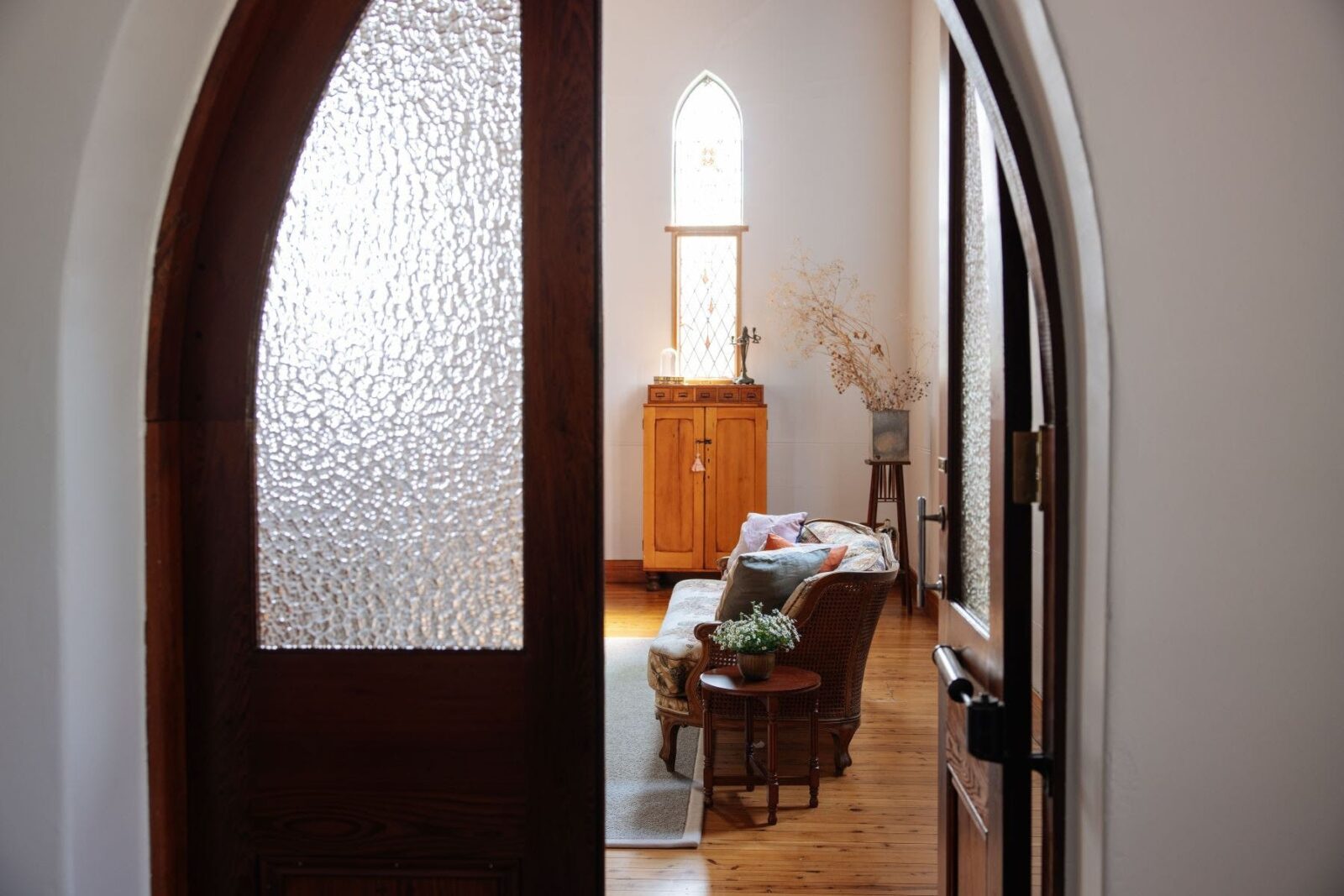 Walk through the entrance/ vestry, and the double Gothic doors open onto the living area.