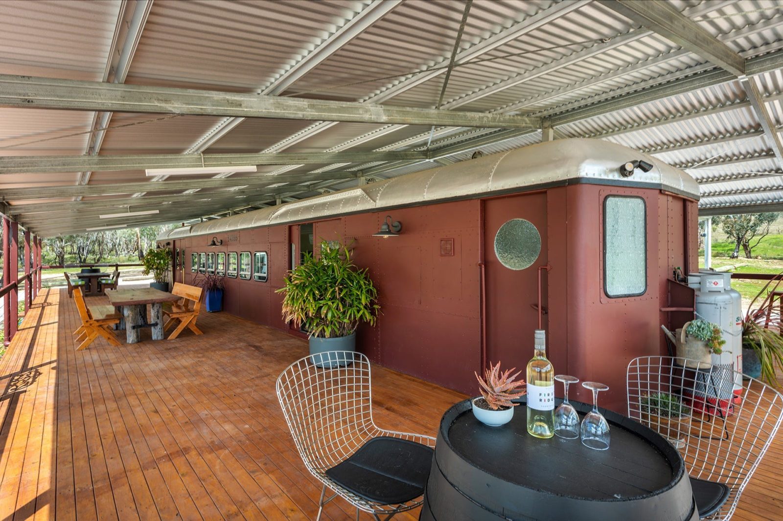 Train carriage and large outside entertaining area