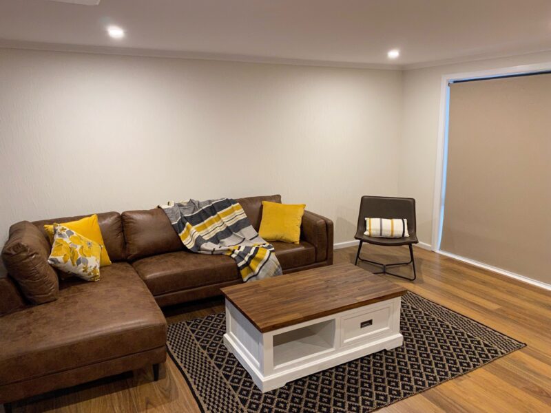 Relax in the spacious living room and enjoy a movie on the large flat screen TV
