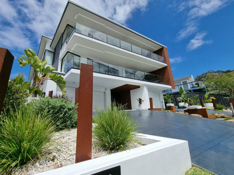 Front of an architecturally-designed waterfront duplex.Luxury five-star furnished holiday rental