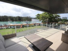 Balcony with uninterrupted lake views and casual setting
