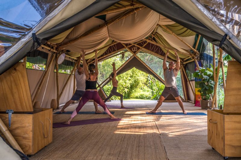 Students practicing yoga at Bamboo Yoga School, Byron Bay