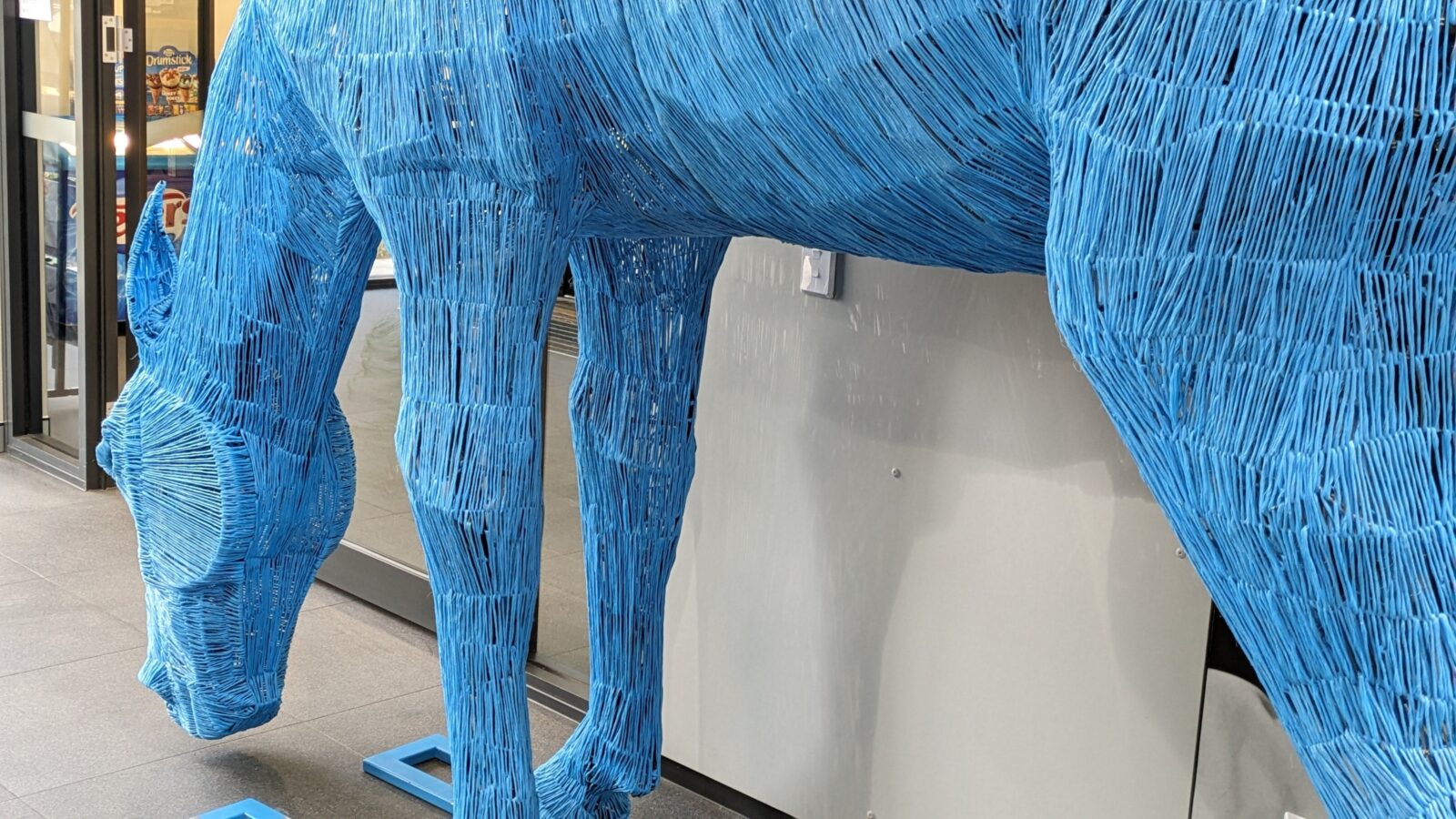 Big Blue horse sculpture made of baling twine