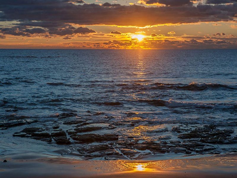 Sunrise over the water at Jervis Bay National Park. Photo: Michael Van Ewijk © DPIE
