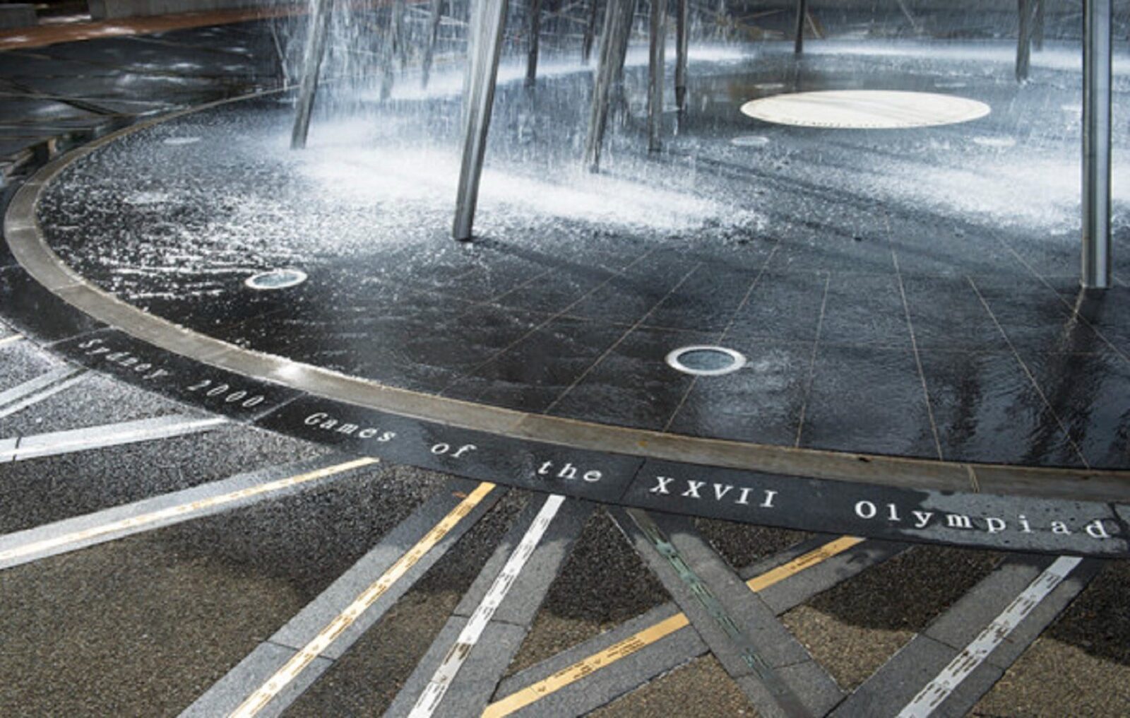 Engraved asphalt surface with plaques