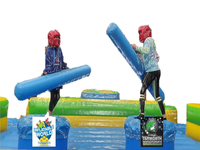Image of two children playing its a knockout