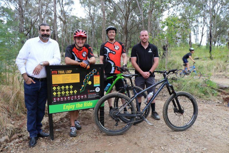 Mountain bikers and Campbelltown Mayor at the opening of the Ingleburn Mountain Bike Trail