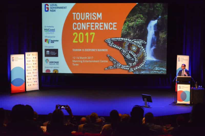 Past Tourism conference on the stage with the Tourism Minister