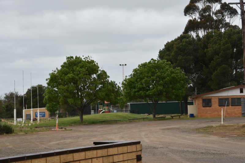 Trees, football posts, a playground and more at Oaklands Recreation Reserve.
