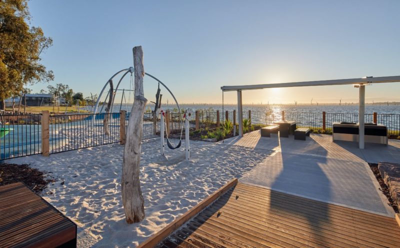 A beach play area leads to barbecue facilities and Lake Mulwala.