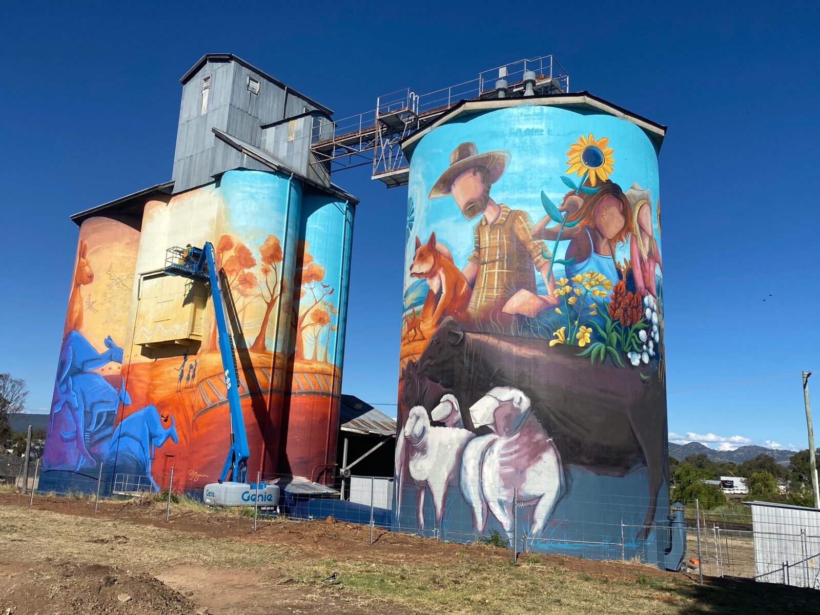Southern Silo with cattle, sheep and girls with sunny