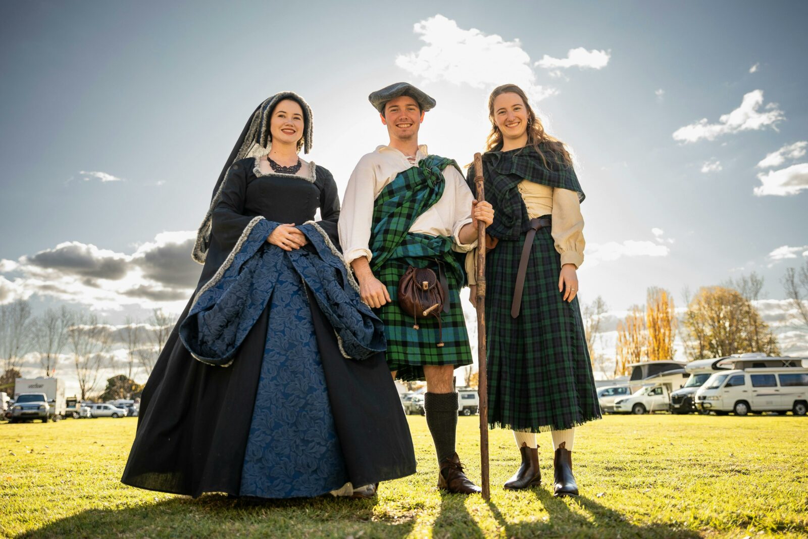 Three festival attendees dressed in traditional Celtic fashions