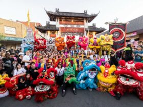 Group photo with lion dancers, community groups and kids part of the Lantern Parade
