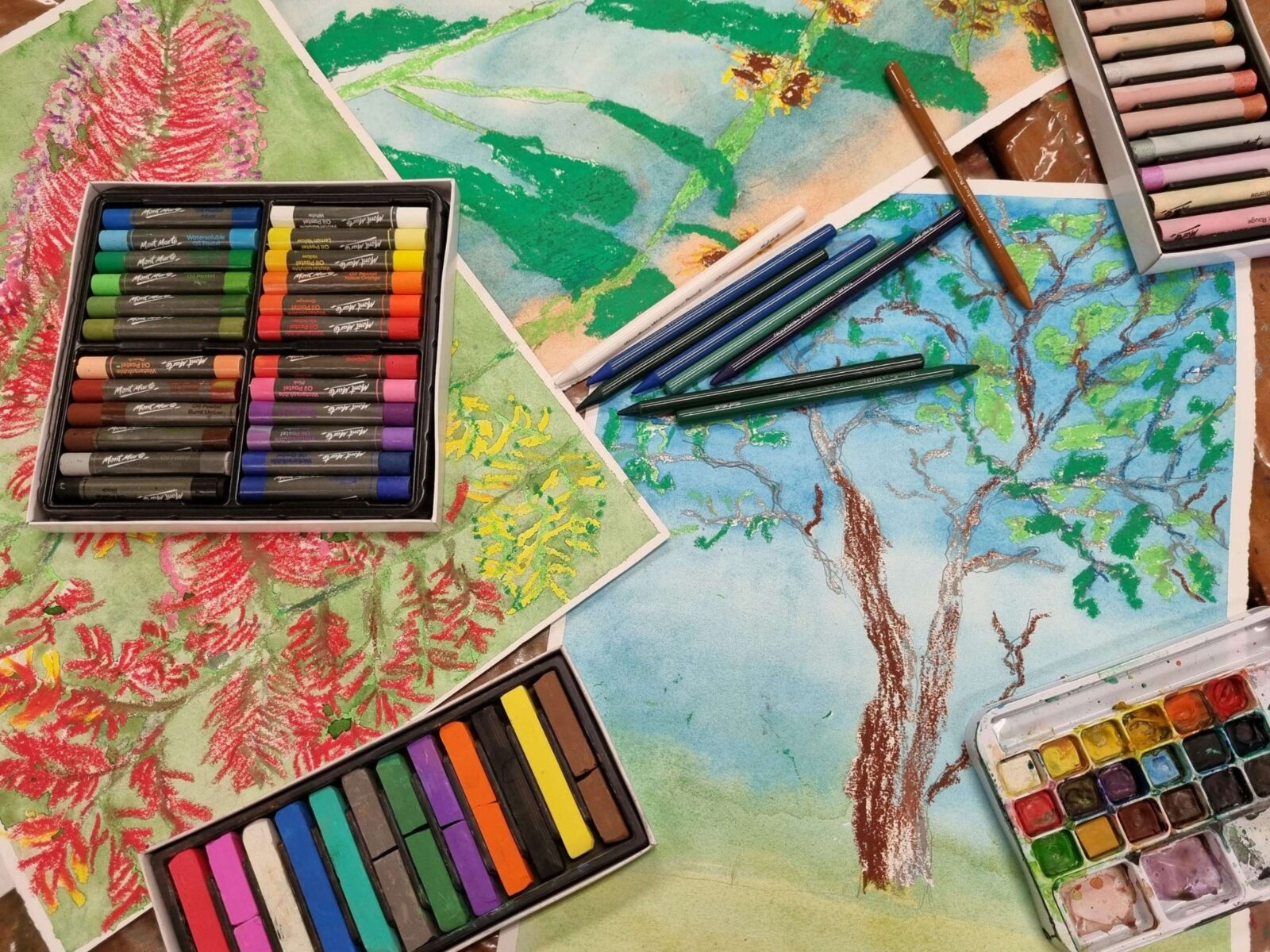 colourful drawing of trees with pastels and pencils