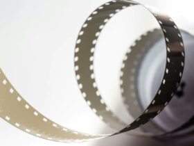 a reel of film with a white background