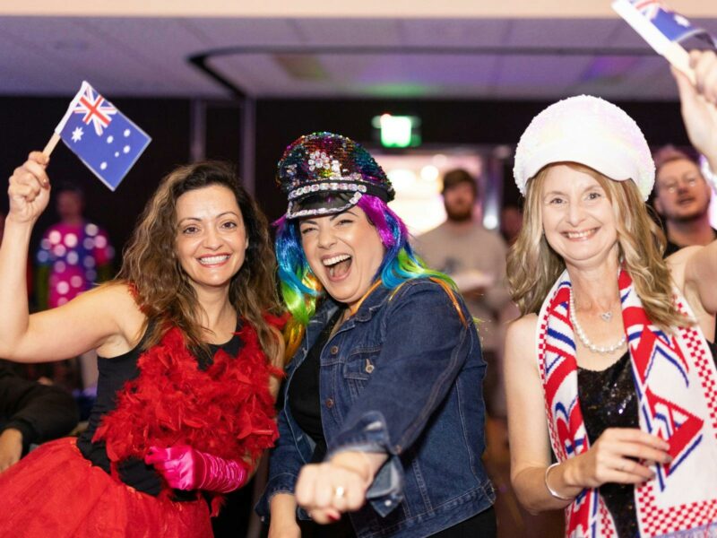 Three women celebrating Eurovision in costume in Hurstville New South Wales