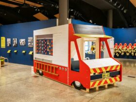 Wooden fire truck within Museum exhibition space