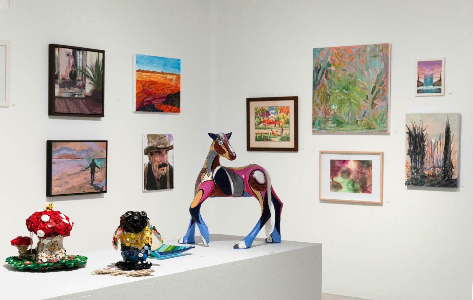 Image of various artworks in Friends exhibition, including paintings, sculptures and ceramics.