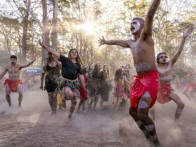 Aboriginal dancers dancing in the dust at Giiyong Festival