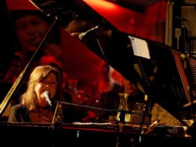 Lady performing on the piano for Jazz Club