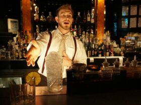 Bar Attendant pouring drinks