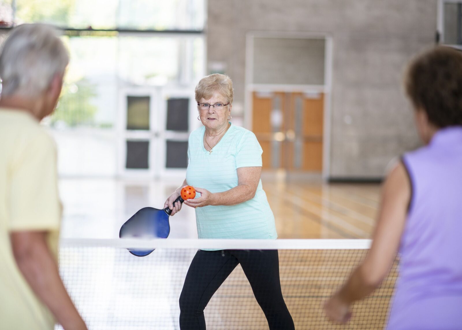People playing Pickleball