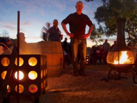 Winemaker Michael, standing by the fire pit