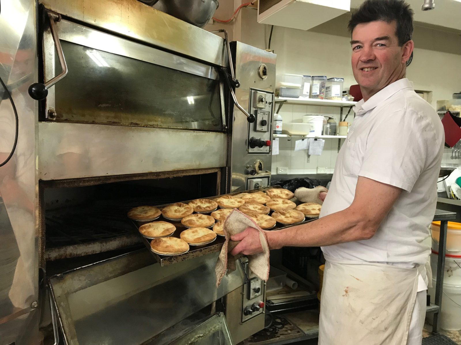 pies coming out of oven