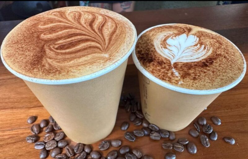 two delicious looking coffees in takeaway cups