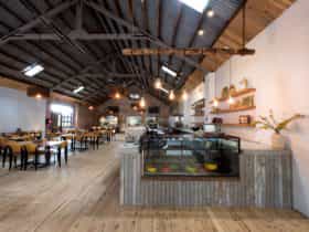 The interior of Coolamon Cheese a large lofted room