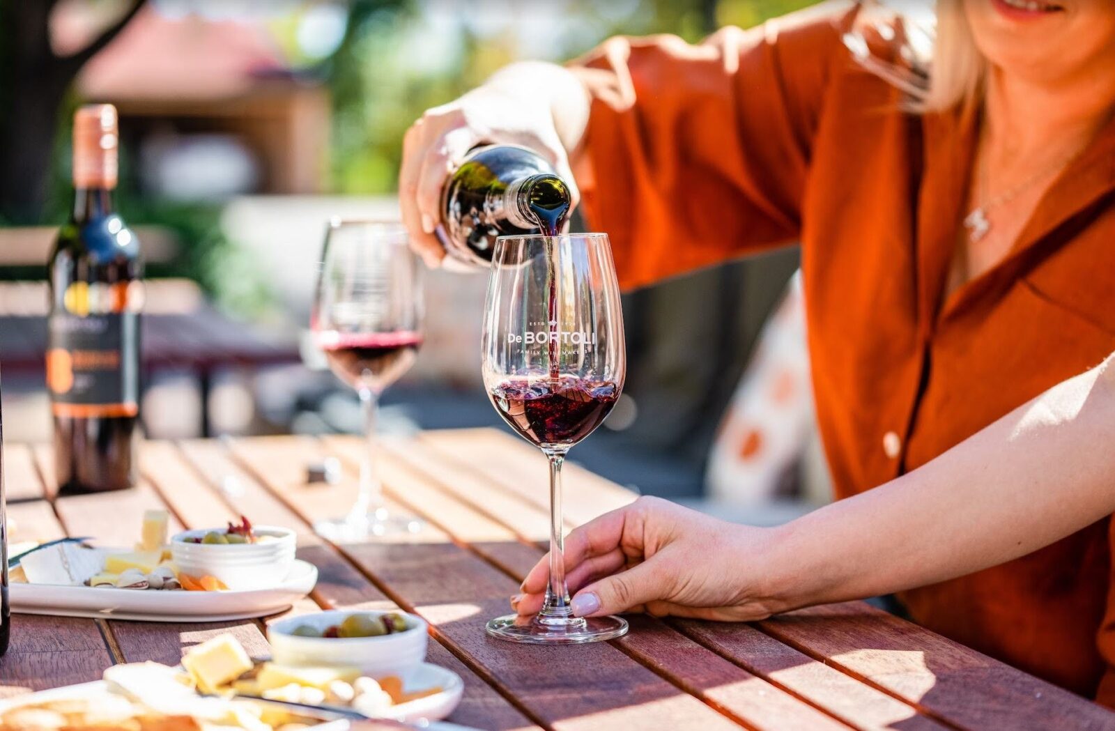 Enjoy a glass of wine and a platter outside Cellar Door