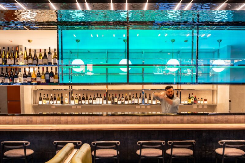 This neon-lit bar will enhance your experience with our great drinks to start off with.