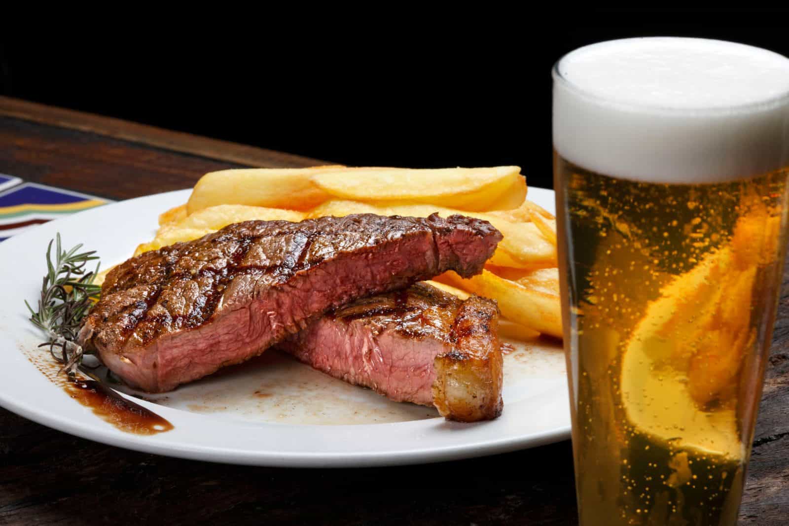 Steak with fries and beer