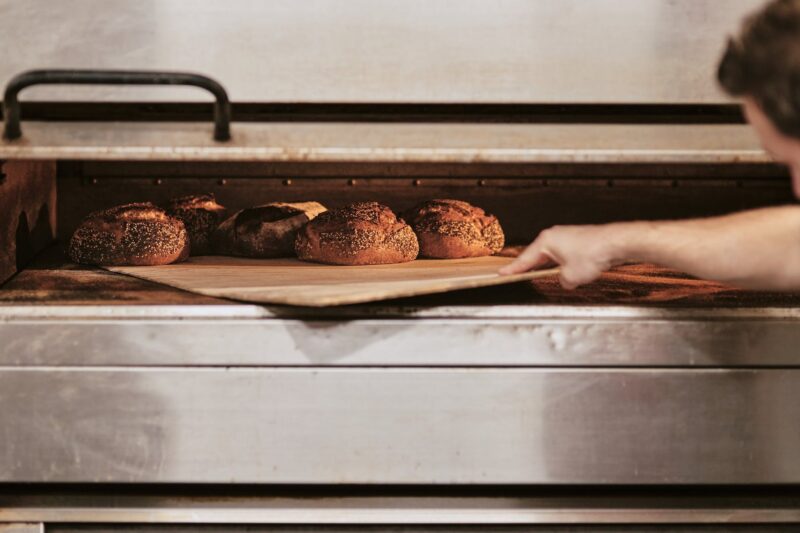 lagom bakery baking sourdough in the oven