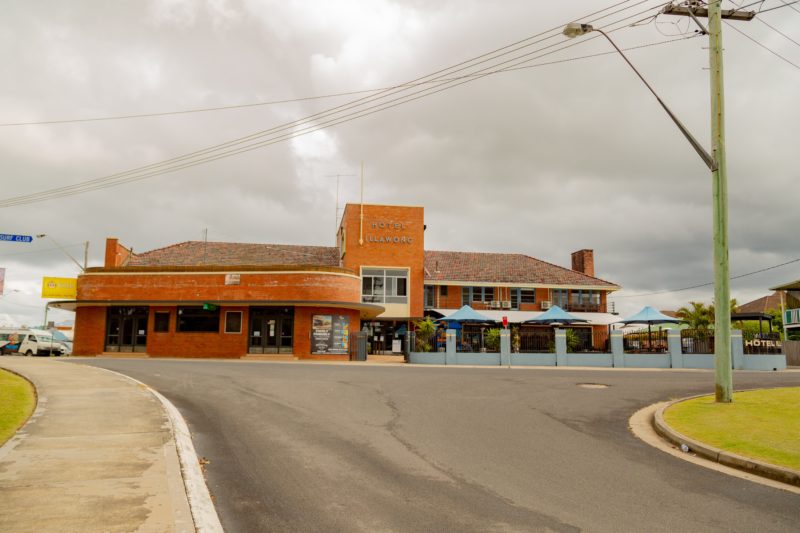 Image of Hotel Illawong, blue bring frontage and heritage brick.