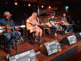 Band live on stage at Moonshiners