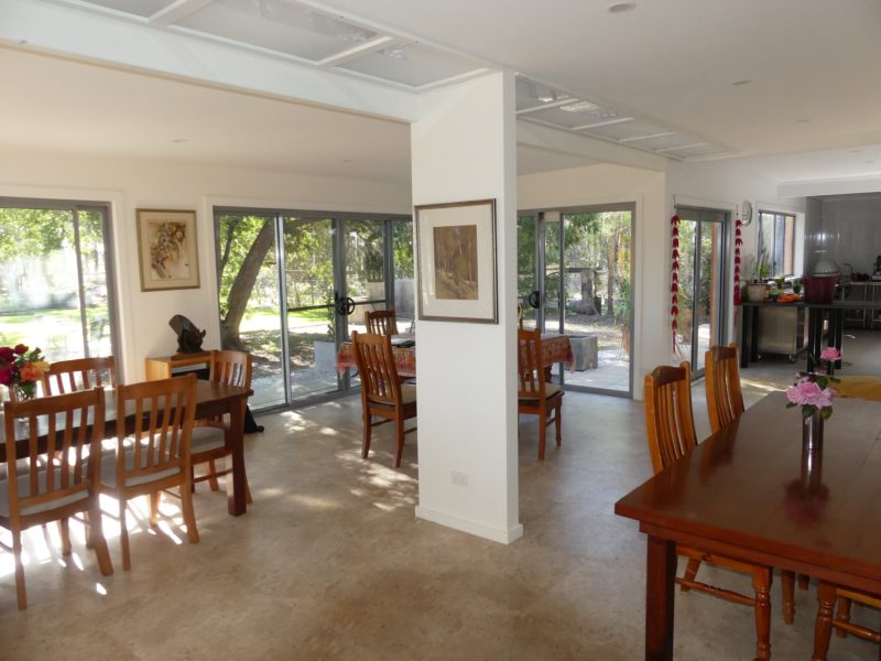 Walk through the cellar door to the restaurant that looks out over a lovely tree-shaded lawn