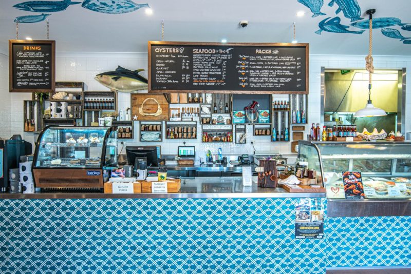 The vibrant takeaway Shop counter, adorned with all-things seafood