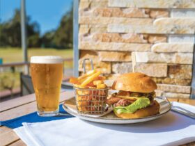 Enjoy a burger and beer in our modern clubhouse