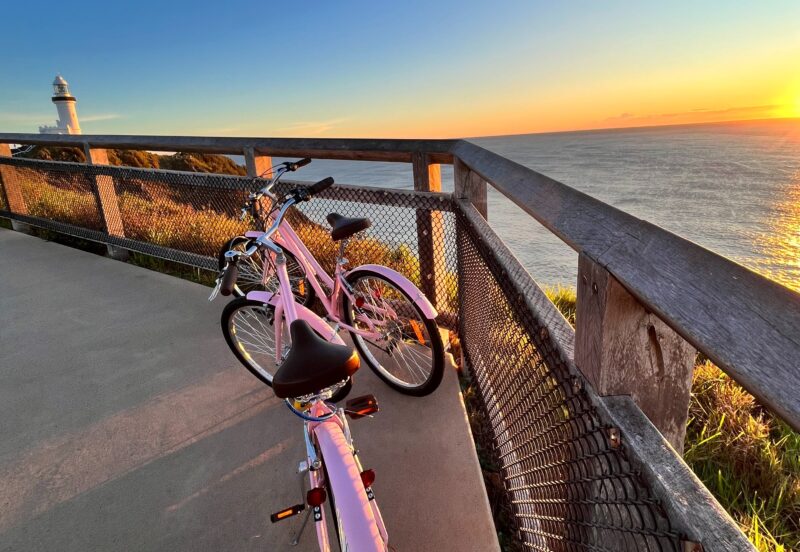 The pink bikes with rising sun in Byron Bay