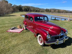 Red 1946 Hudson for wedding, wine tours and special occasions.