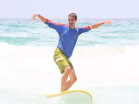 Surfing first lesson easy fun and safe Equipment supplied Head Coach World Champion Cheyne Horan