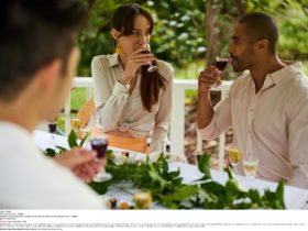 Couple enjoying chocolate and wine pairing