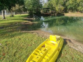 Kayak and zipline across the swimming hole